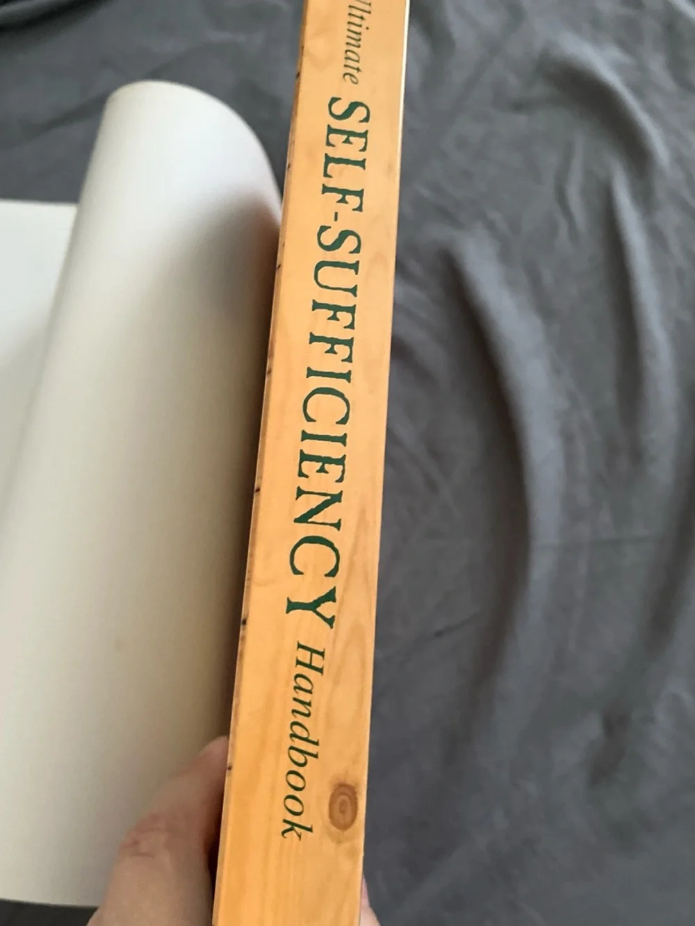 The Ultimate Self-Sufficiency Handbook by Abigail R. Gehring - Green & Red Cover